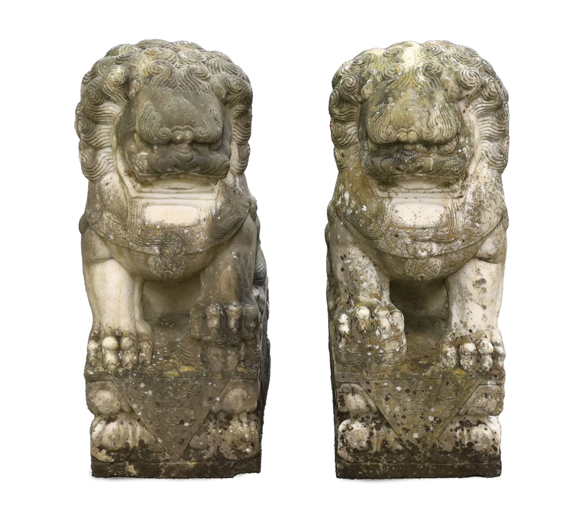 A pair of 20th century Chinese carved marble garden statues modelled as Dogs of Fo, each with weathered finish, 22cm wide, 31cm deep, 54cm high